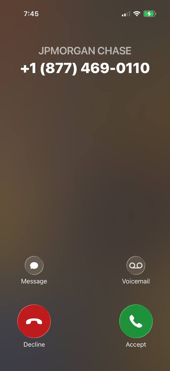 Incoming iPhone call labeled JPMORGAN CHASE, +1 877-469-0110