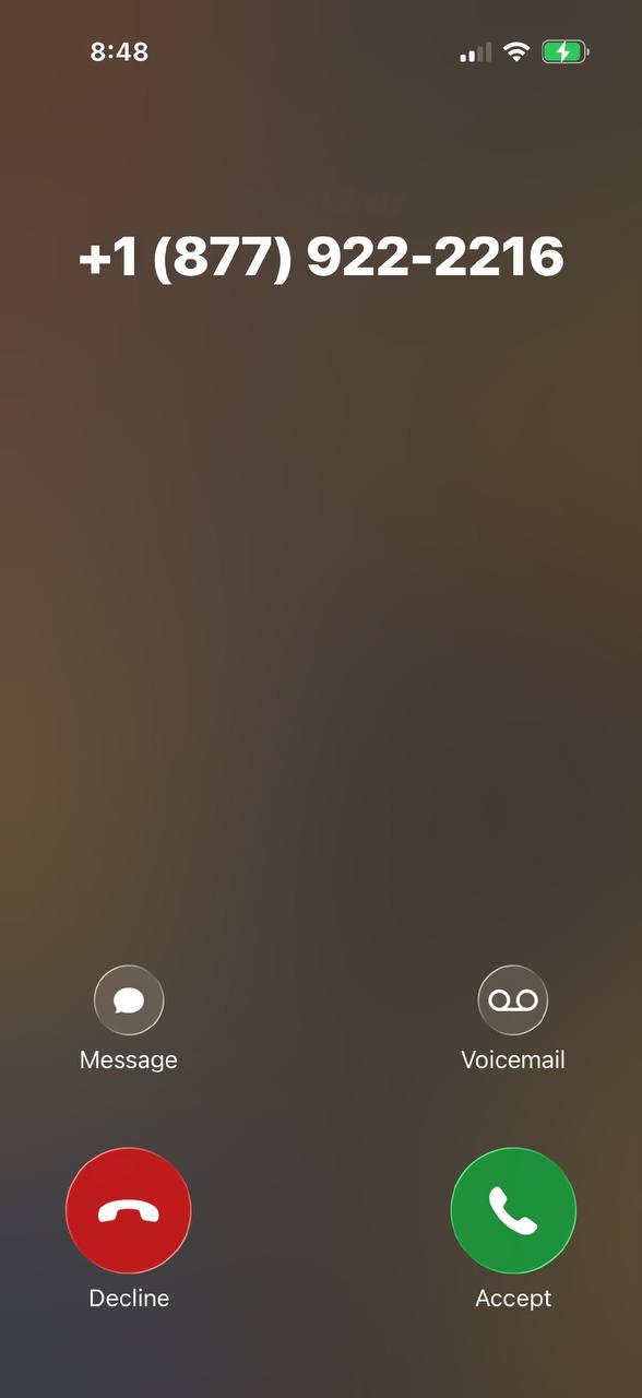 iPhone incoming call, +1 877-922-2216, no caller name, clock 8:48