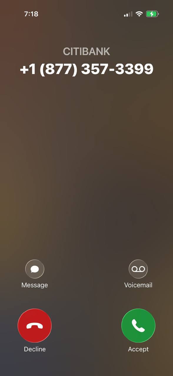 Incoming iPhone call labeled CITIBANK, +1 877-357-3399
